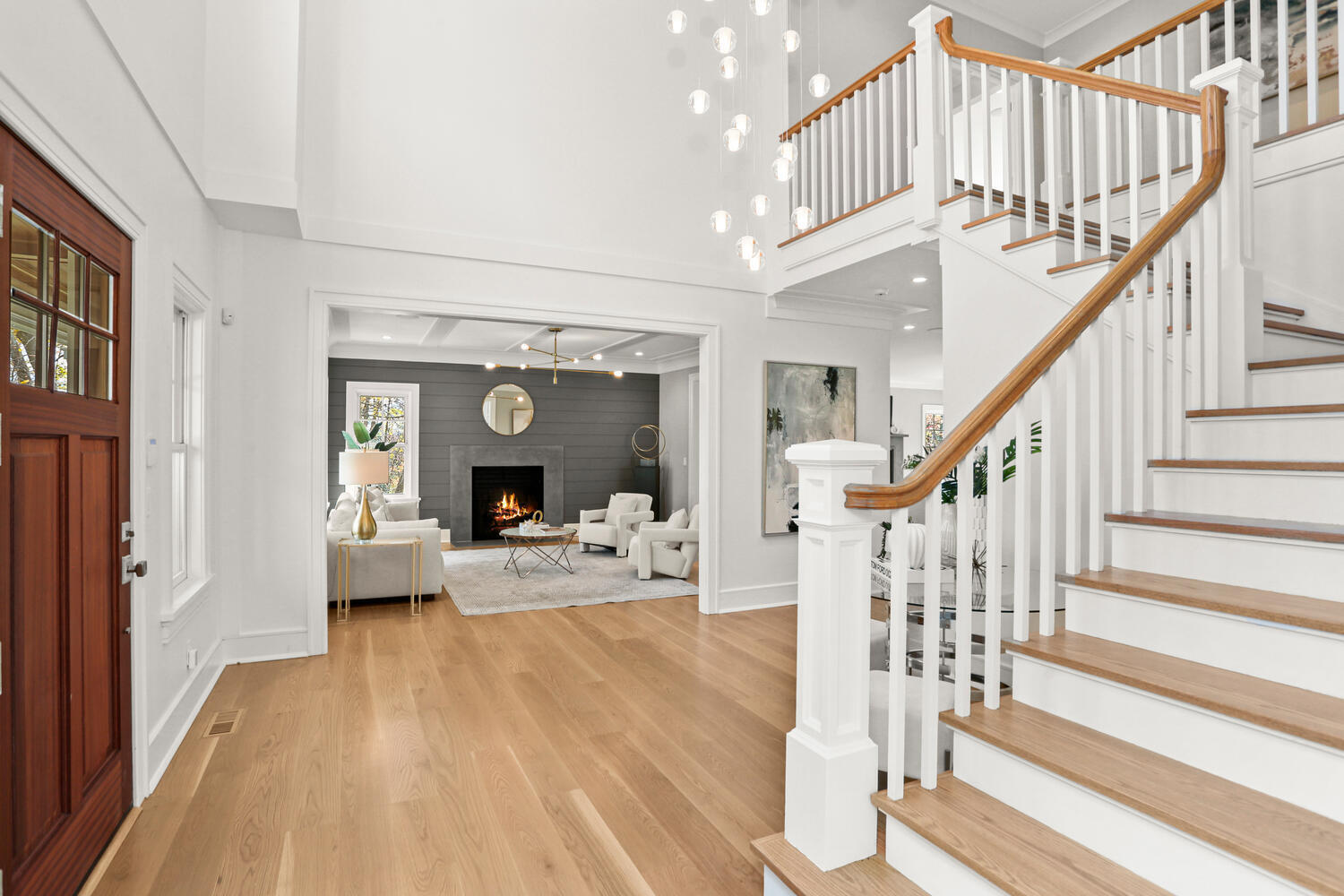 24 Country Club Road New Canaan, CT 06840 - Photo 26 of 43 a view of front door with dining room and wooden floor