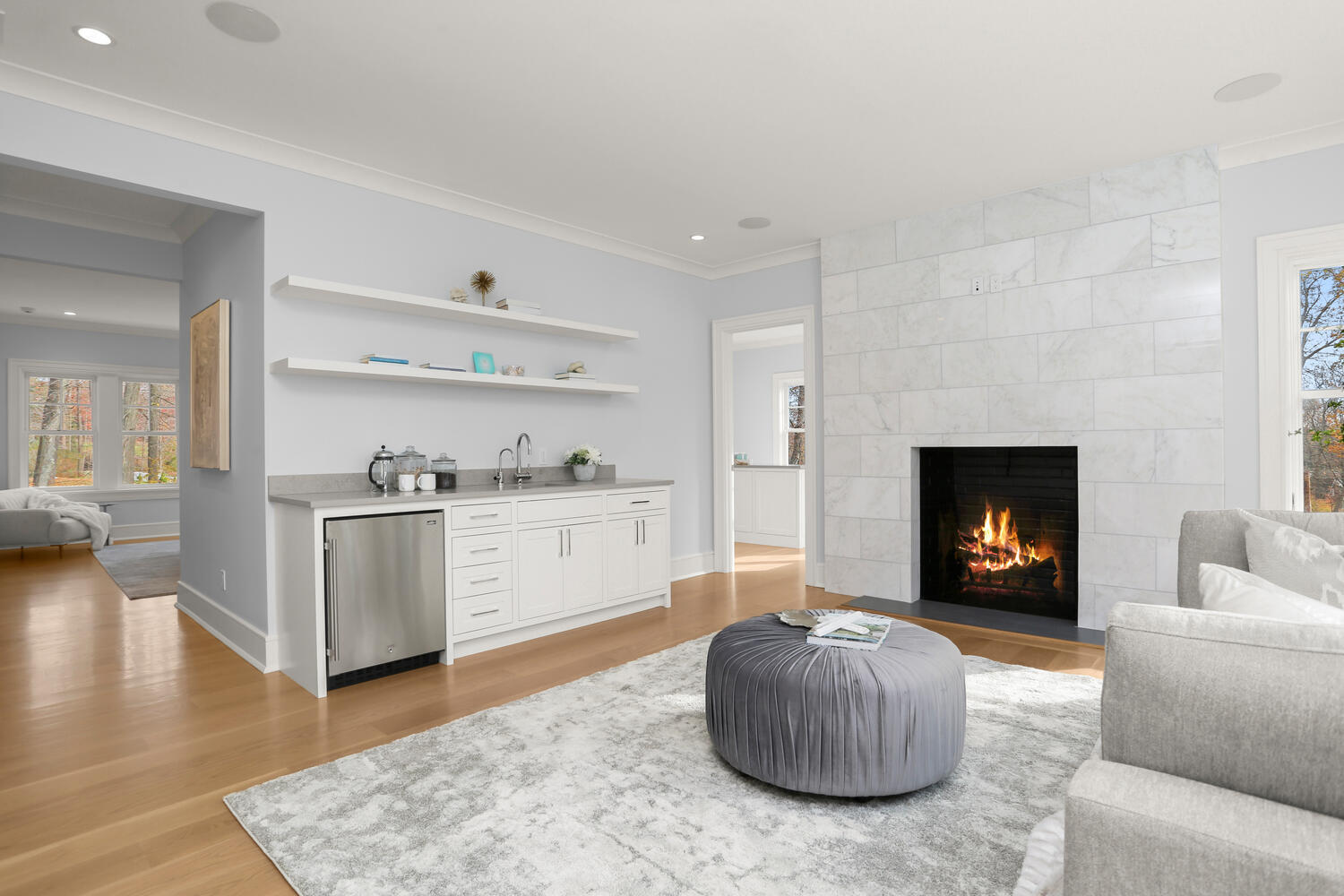 24 Country Club Road New Canaan, CT 06840 - Photo 28 of 43 a living room with furniture and a fireplace