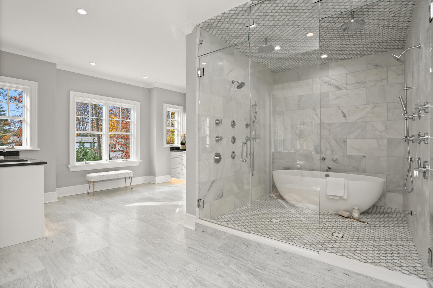 24 Country Club Road New Canaan, CT 06840 - Photo 31 of 43 a spacious bathroom with a bathtub and a sink