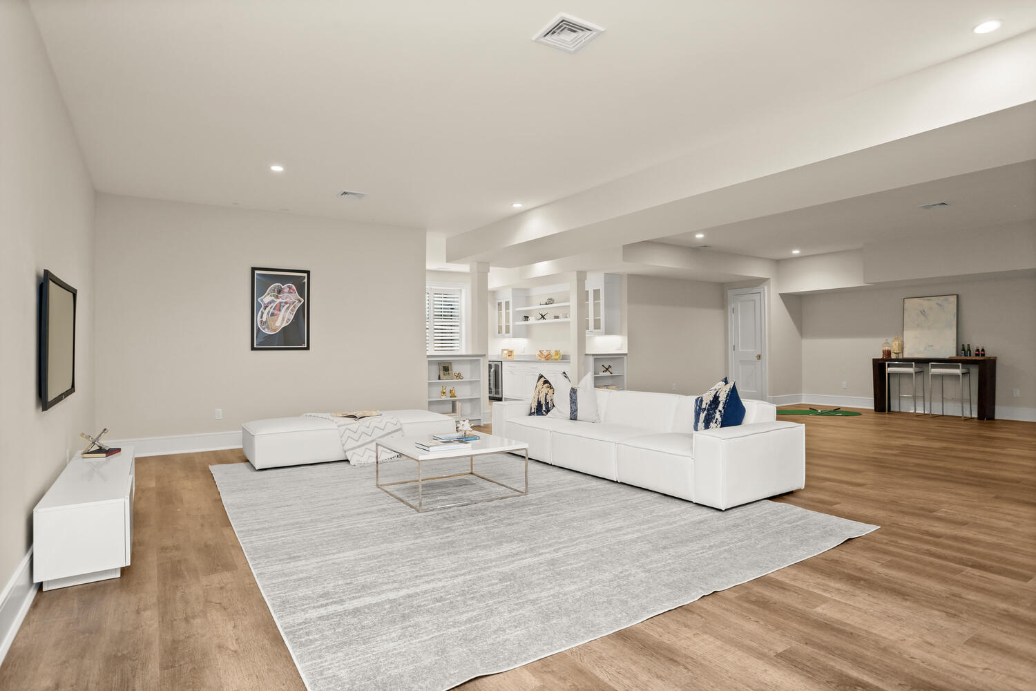 24 Country Club Road New Canaan, CT 06840 - Photo 36 of 43 a living room with furniture and a wooden floor