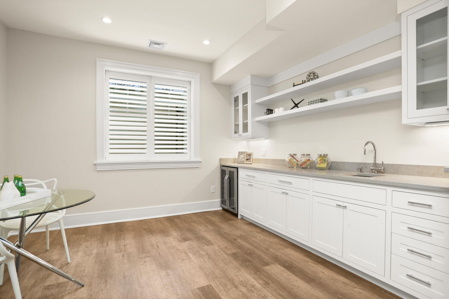 24 Country Club Road New Canaan, CT 06840 - Photo 38 of 43 a spacious bathroom with a granite countertop sink and a mirror