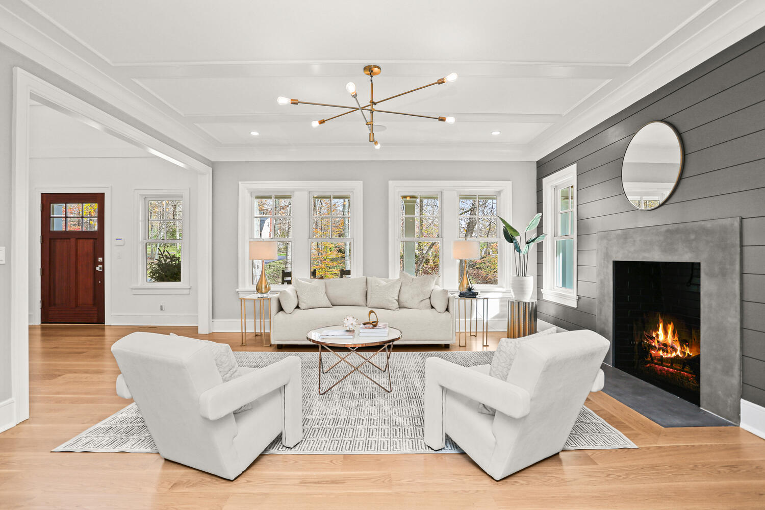 24 Country Club Road New Canaan, CT 06840 - Photo 6 of 43 a living room with furniture a fireplace and a large window