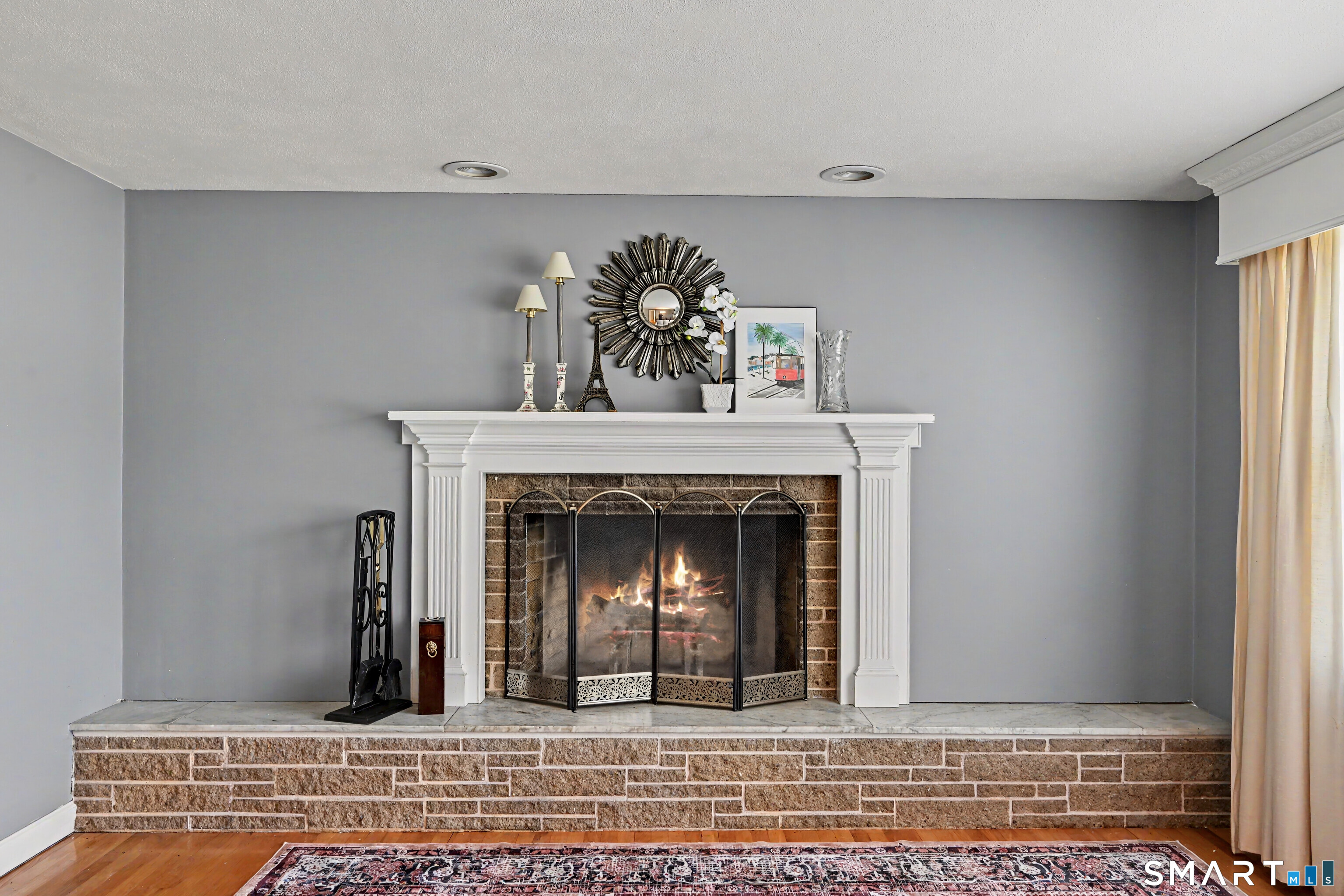 524 Ferry Road Orange, CT 06477 - Photo 7 of 40 a view of a livingroom with a fireplace