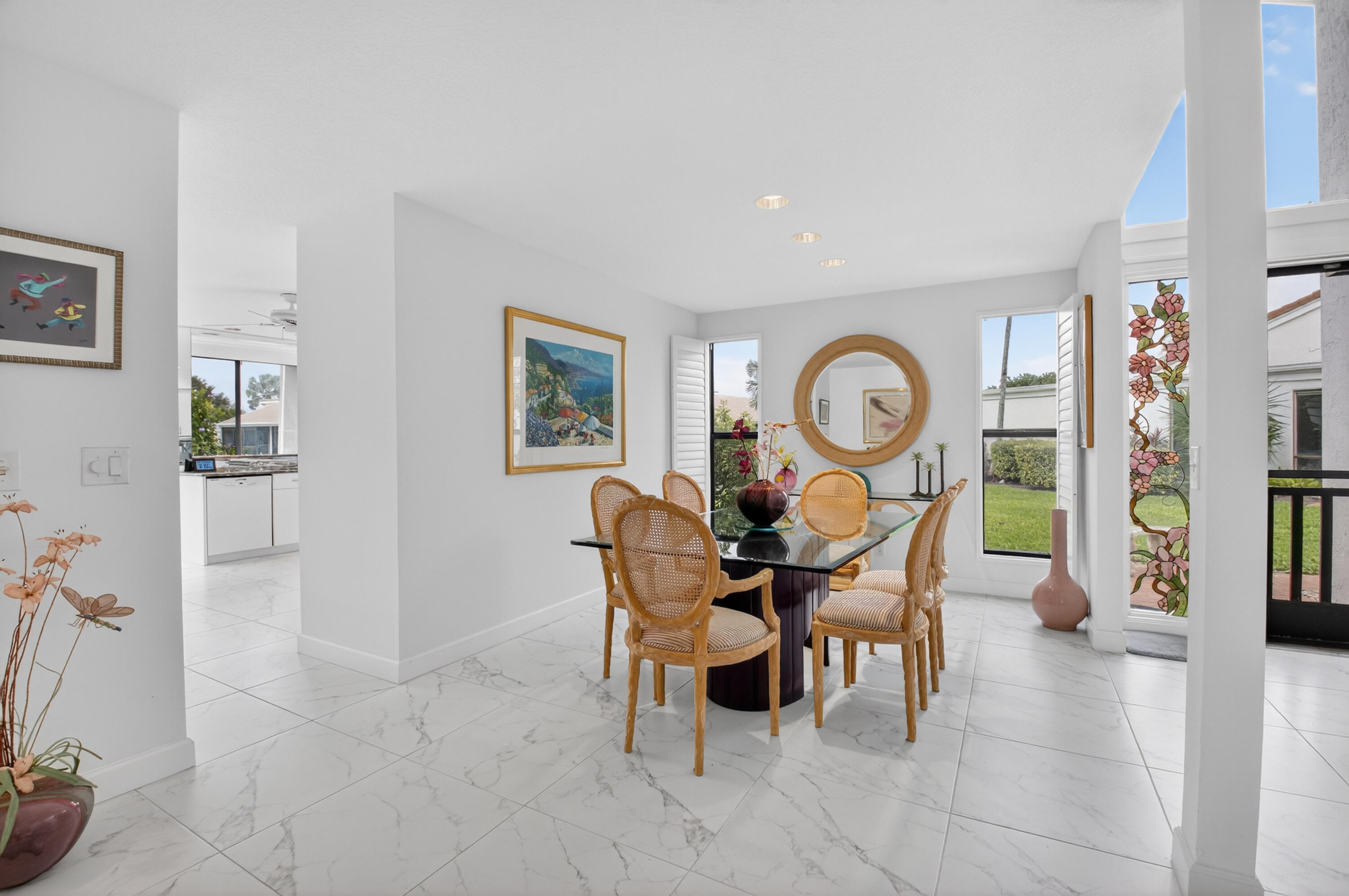 19620 Sawgrass Circle, Unit 2802 Boca Raton, FL 33434 - Photo 14 of 79 a view of a dining room with furniture and wooden floor