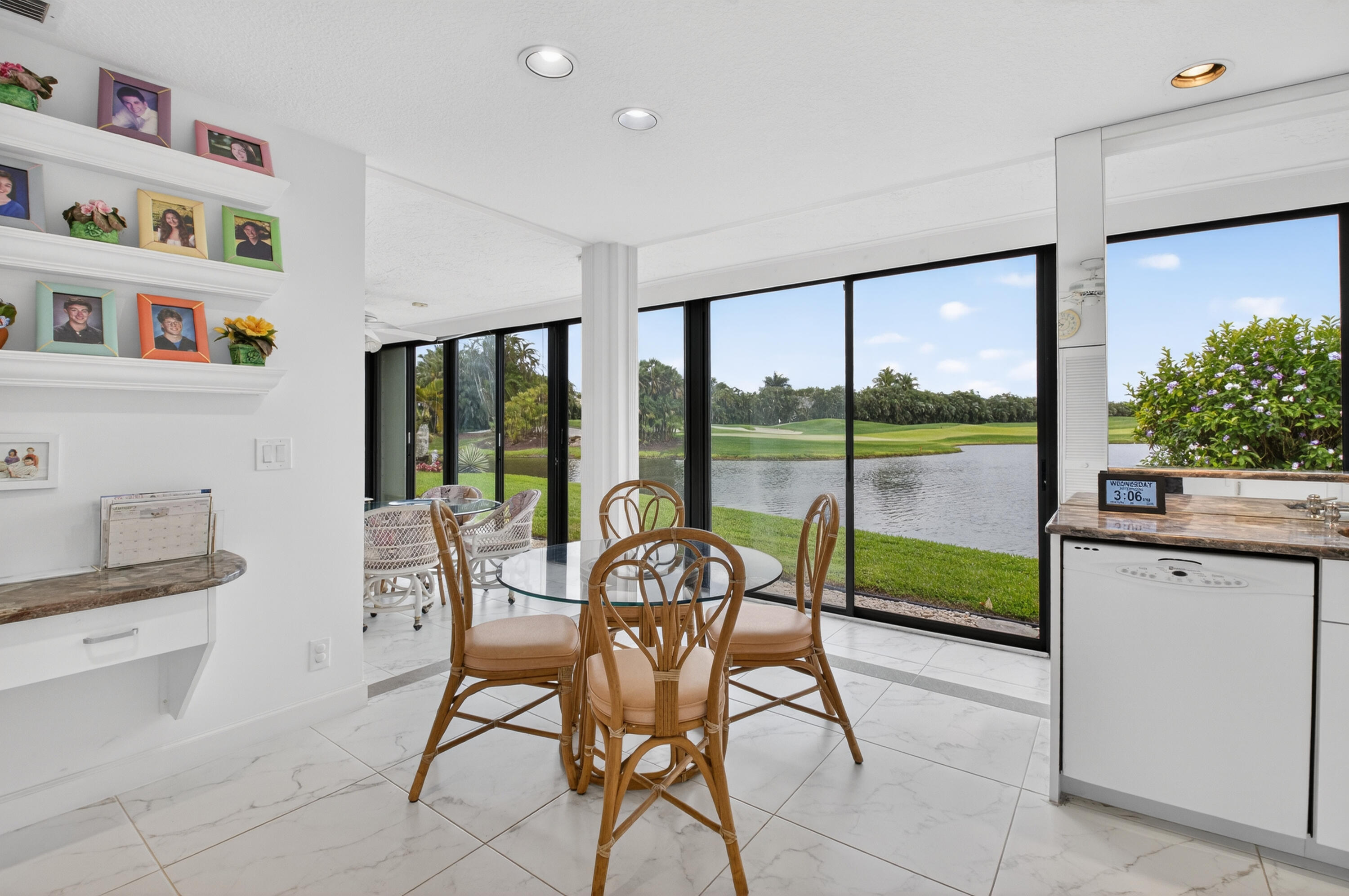 19620 Sawgrass Circle, Unit 2802 Boca Raton, FL 33434 - Photo 15 of 79 a living room with furniture and a floor to ceiling window