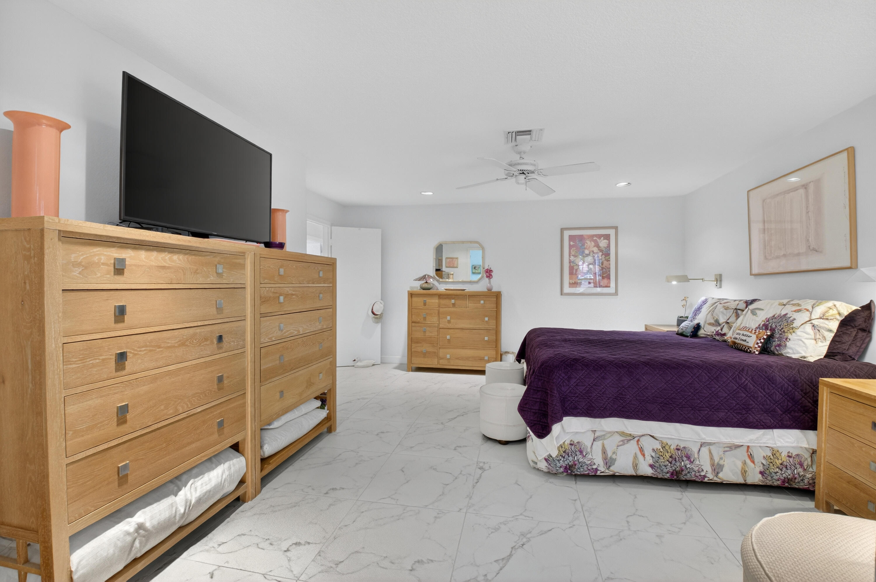 19620 Sawgrass Circle, Unit 2802 Boca Raton, FL 33434 - Photo 17 of 79 a living room with furniture and a flat screen tv