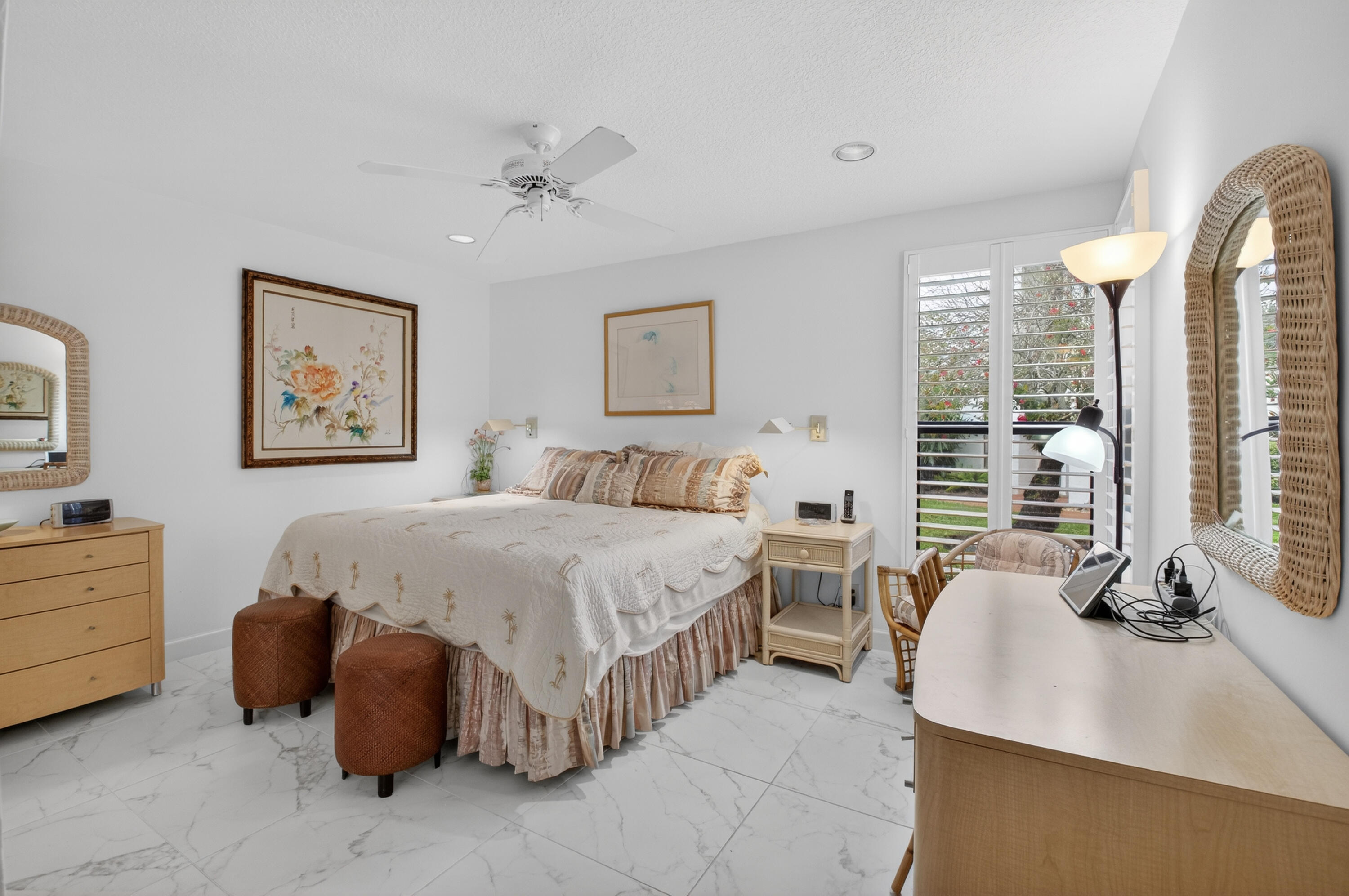 19620 Sawgrass Circle, Unit 2802 Boca Raton, FL 33434 - Photo 21 of 79 a spacious bedroom with a bed and a desk