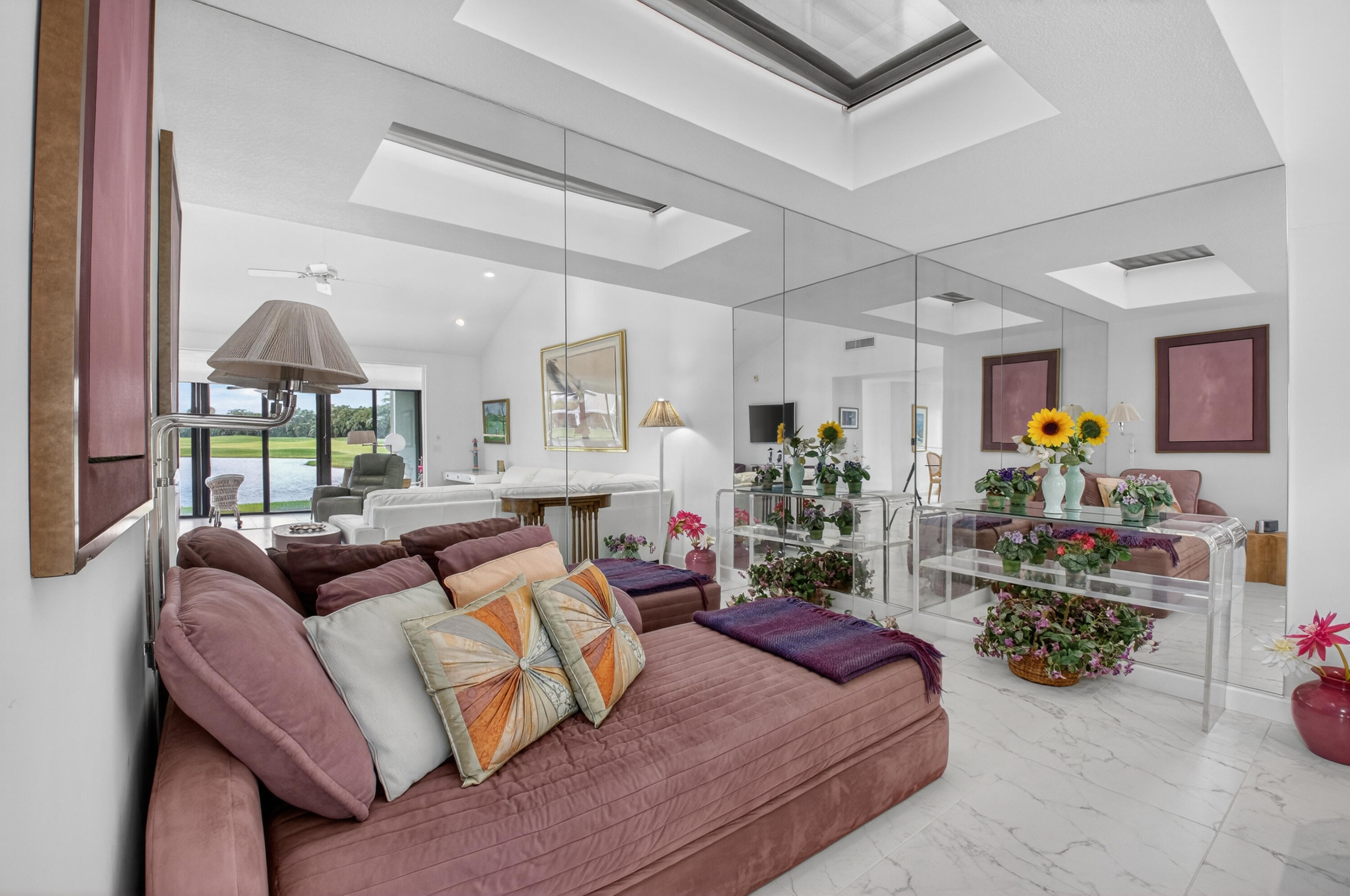 19620 Sawgrass Circle, Unit 2802 Boca Raton, FL 33434 - Photo 4 of 79 a living room with furniture and a large window