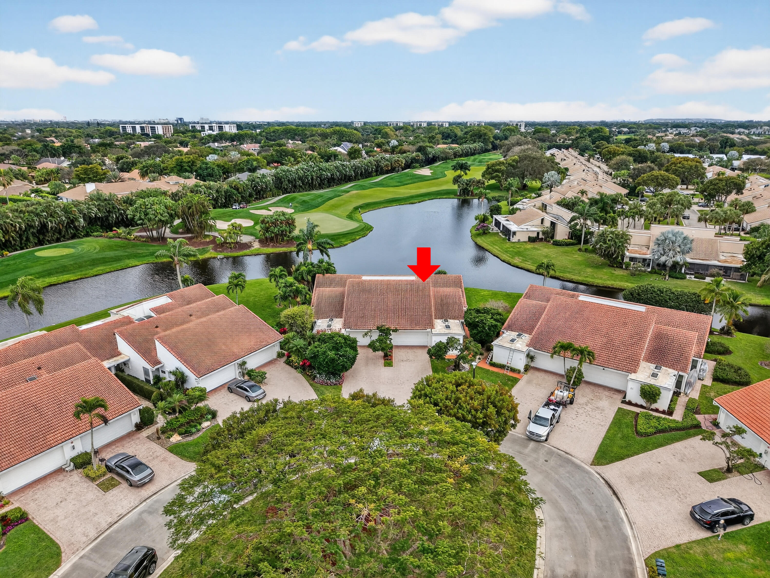 19620 Sawgrass Circle, Unit 2802 Boca Raton, FL 33434 - Photo 41 of 79 an aerial view of a city with lots of residential buildings ocean and mountain view in back
