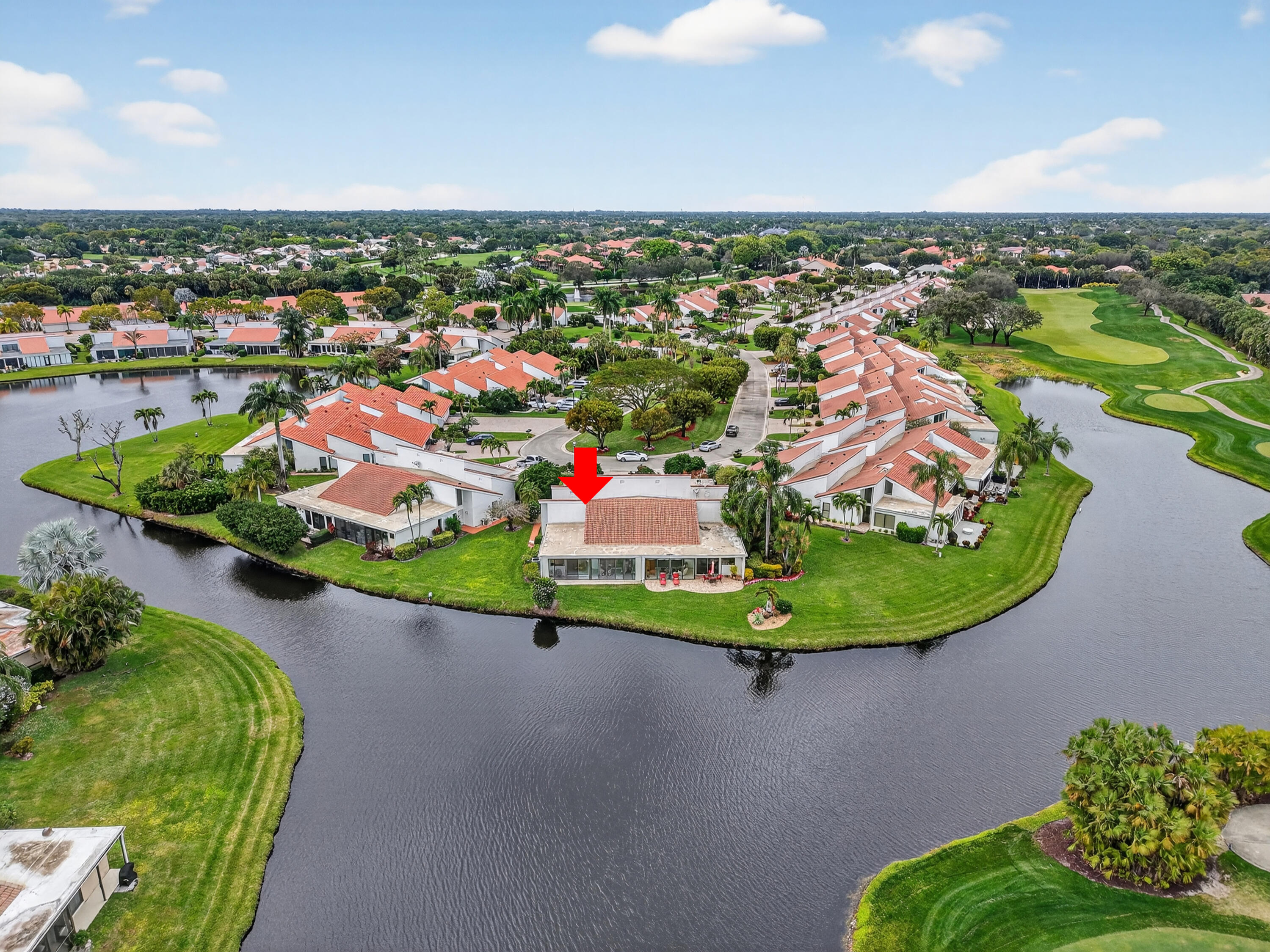 19620 Sawgrass Circle, Unit 2802 Boca Raton, FL 33434 - Photo 46 of 79 an aerial view of a house with a garden and lake view