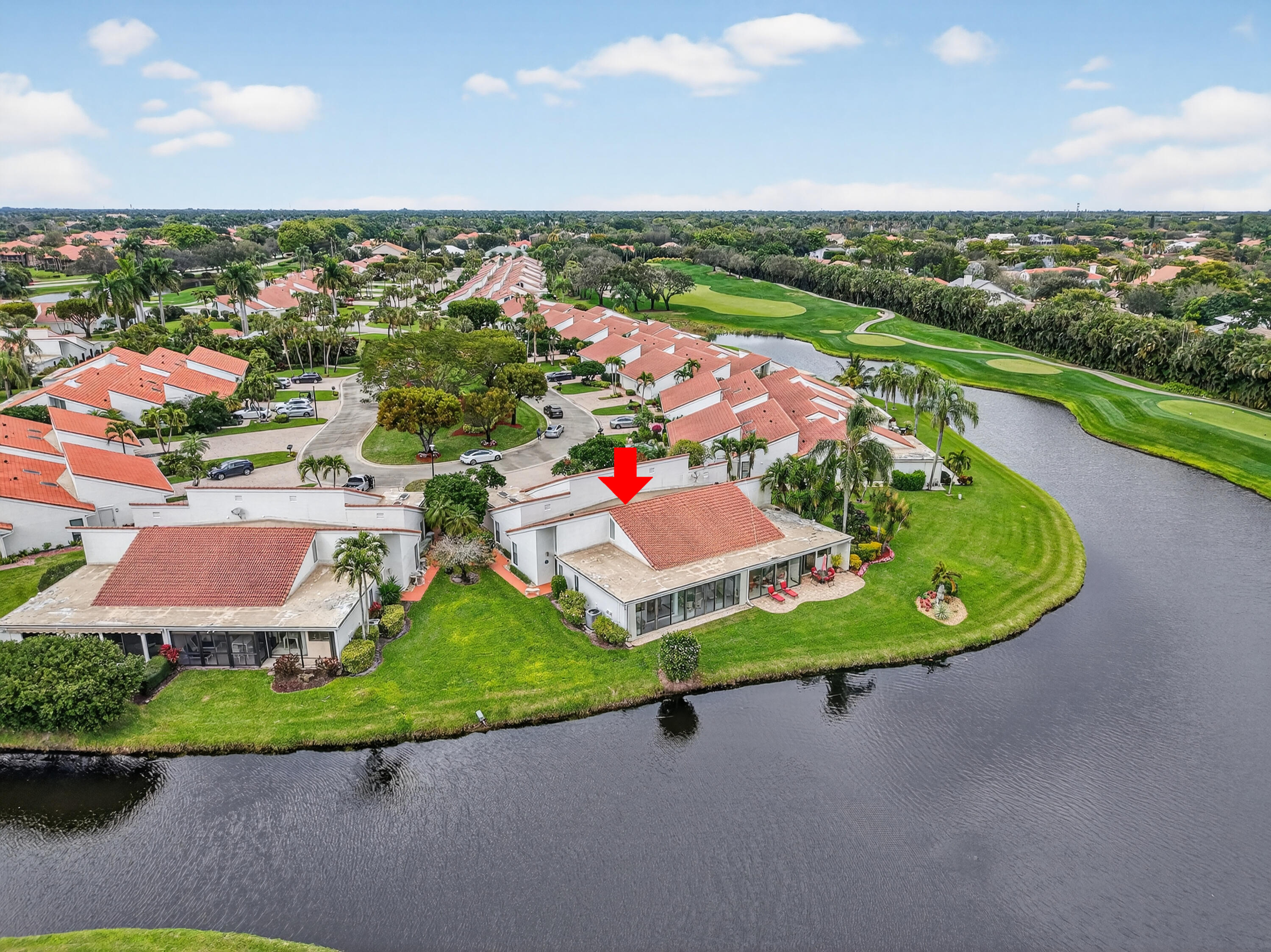 19620 Sawgrass Circle, Unit 2802 Boca Raton, FL 33434 - Photo 47 of 79 an aerial view of a house with a garden and lake view