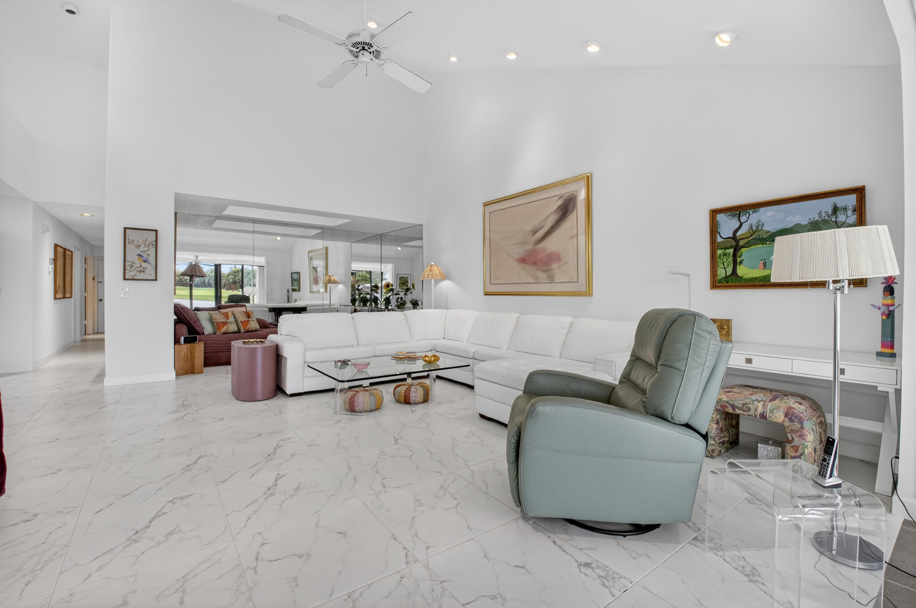 19620 Sawgrass Circle, Unit 2802 Boca Raton, FL 33434 - Photo 6 of 79 a living room with furniture and a table