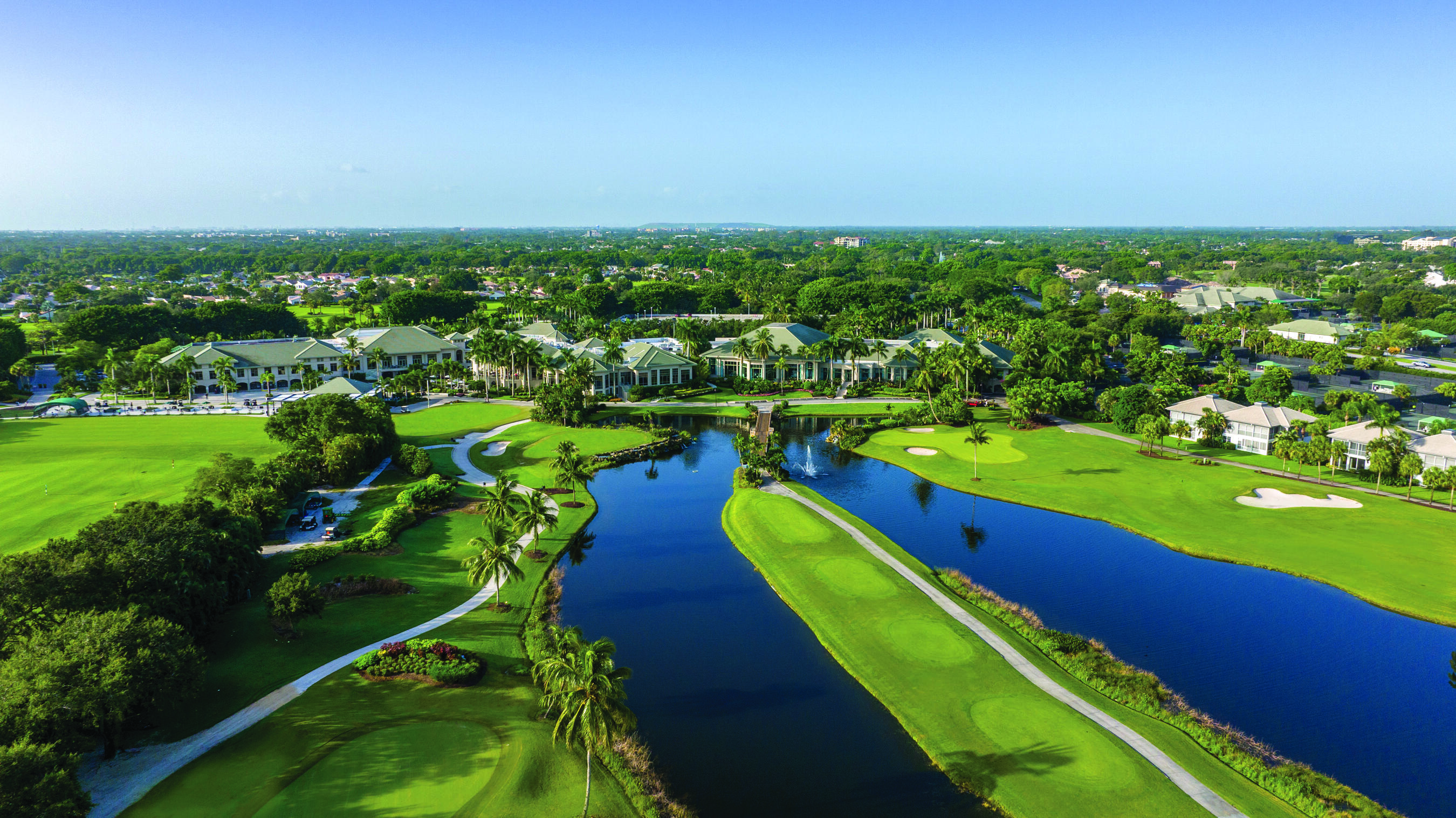 19620 Sawgrass Circle, Unit 2802 Boca Raton, FL 33434 - Photo 76 of 79 an aerial view of residential houses with outdoor space and swimming pool