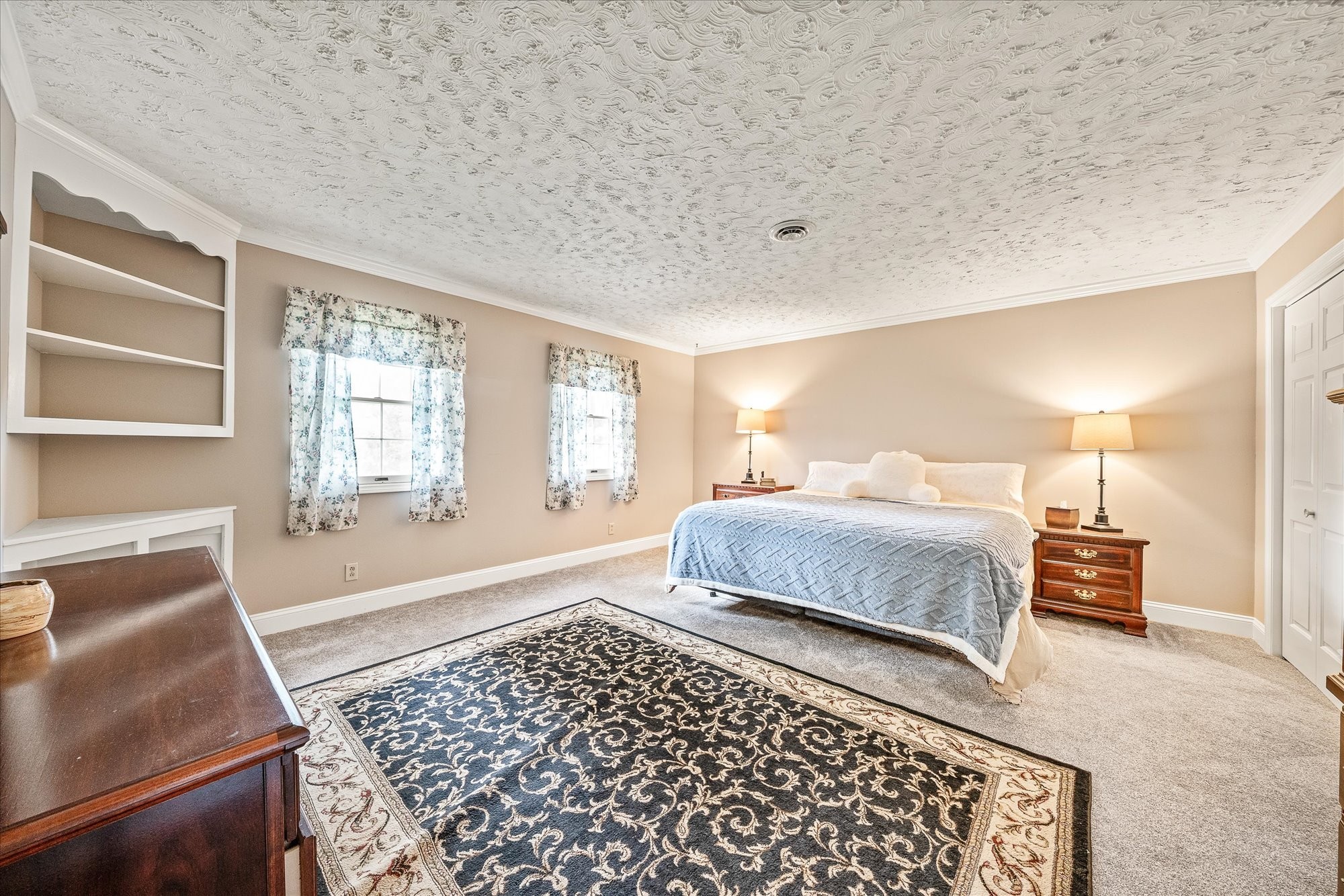 221 Magnolia Road Sparta, TN 38583 - Photo 11 of 36 a bedroom with a bed and a couch