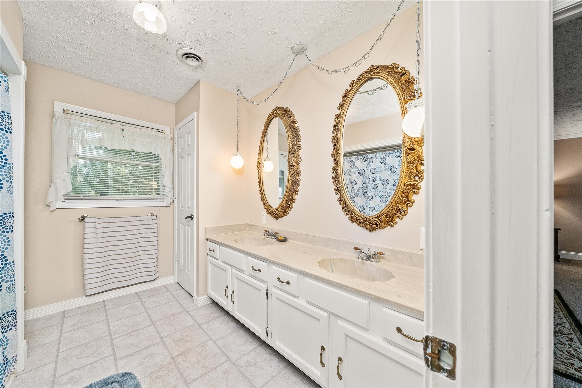 221 Magnolia Road Sparta, TN 38583 - Photo 13 of 36 a bathroom with a sink and a mirror