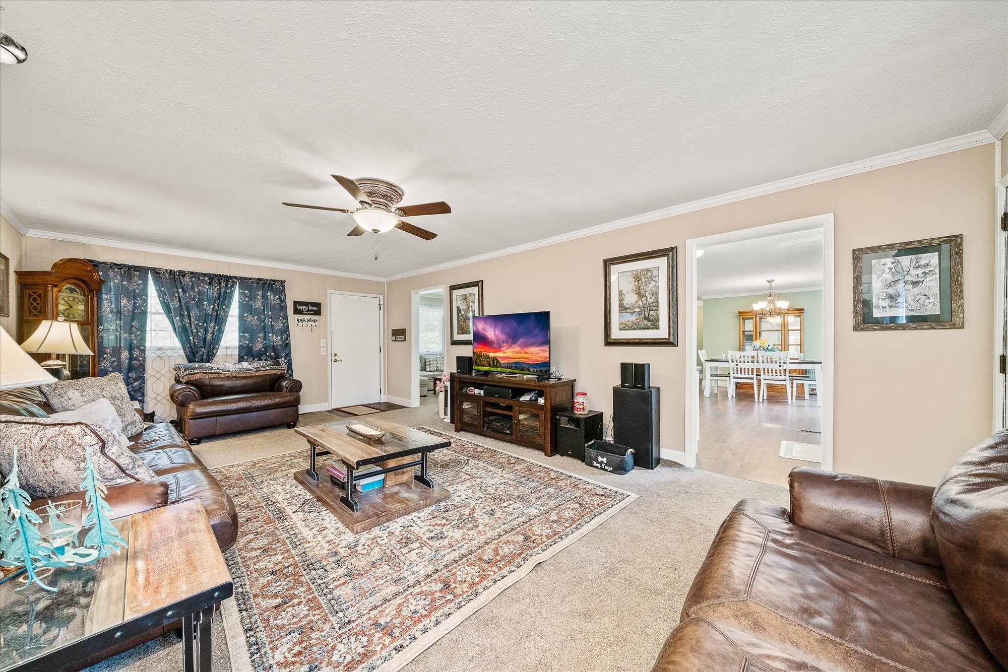 221 Magnolia Road Sparta, TN 38583 - Photo 2 of 36 a living room with furniture and a flat screen tv