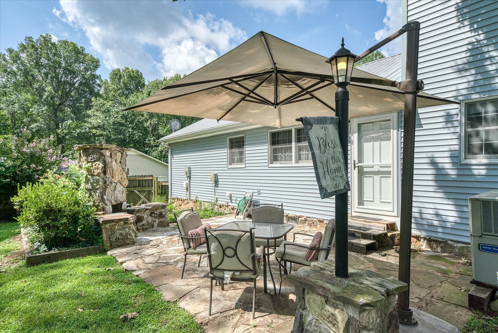 221 Magnolia Road Sparta, TN 38583 - Photo 24 of 36 a view of a house with backyard and sitting area