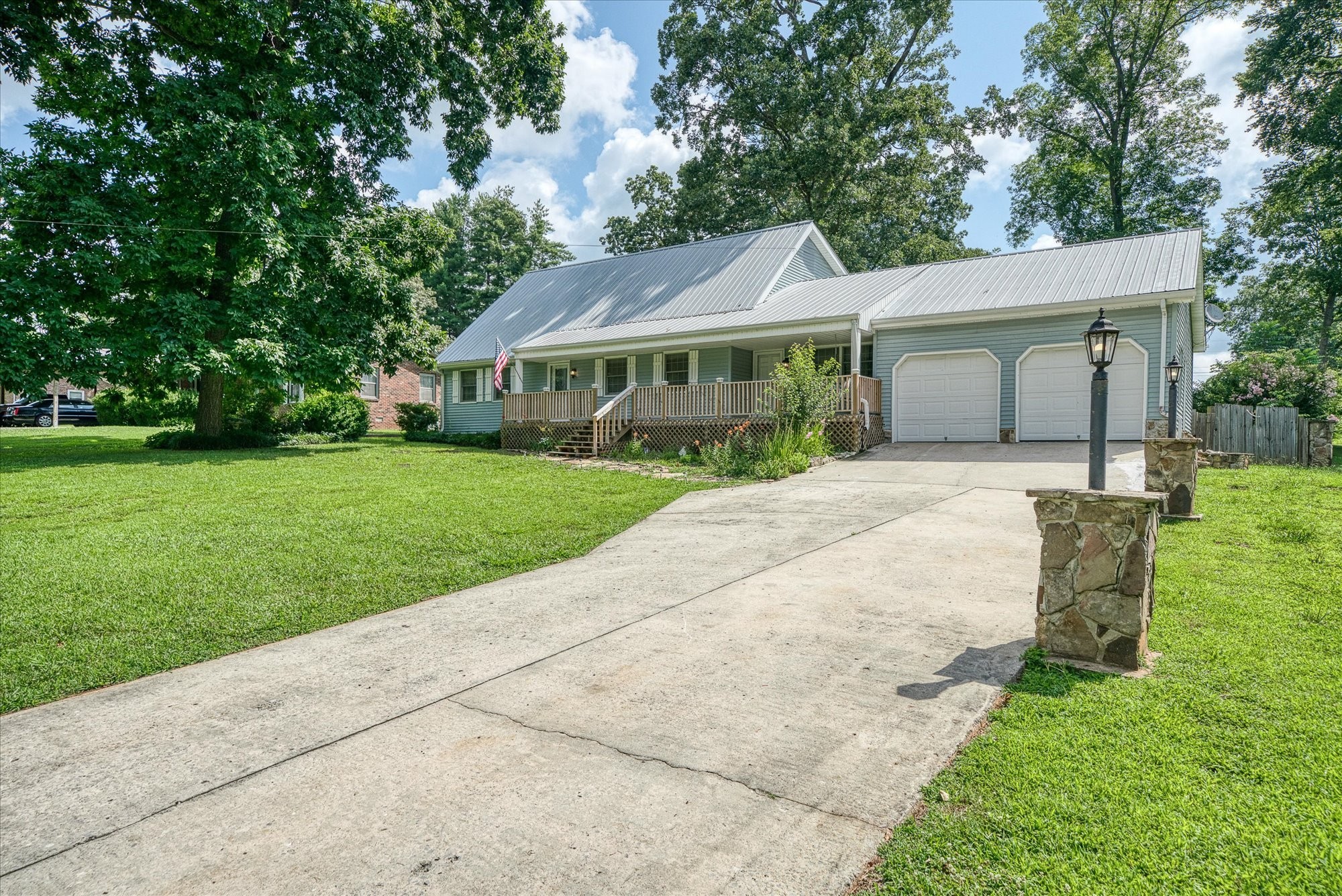 221 Magnolia Road Sparta, TN 38583 - Photo 30 of 36 front view of a house with a yard