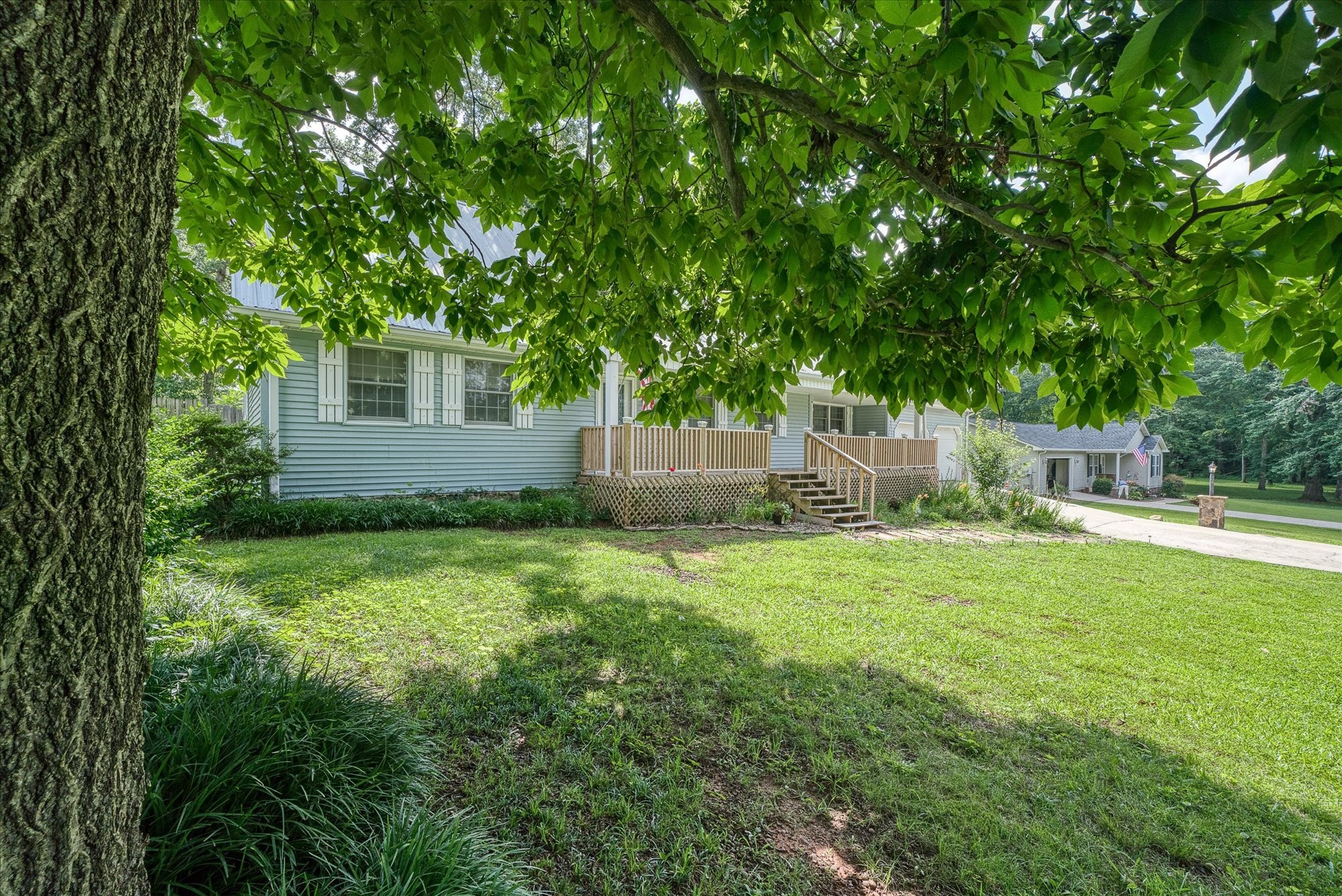 221 Magnolia Road Sparta, TN 38583 - Photo 31 of 36 a view of a house with a yard