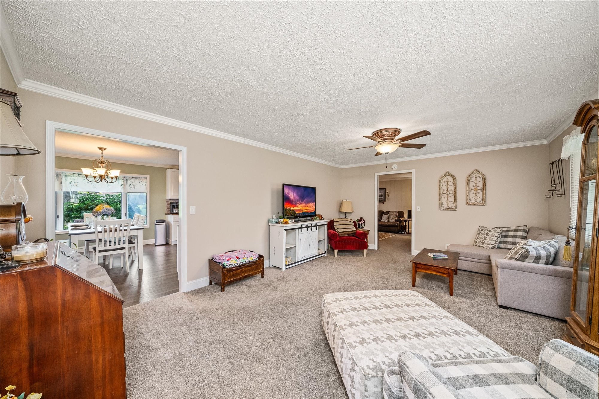 221 Magnolia Road Sparta, TN 38583 - Photo 8 of 36 a living room with furniture and a flat screen tv