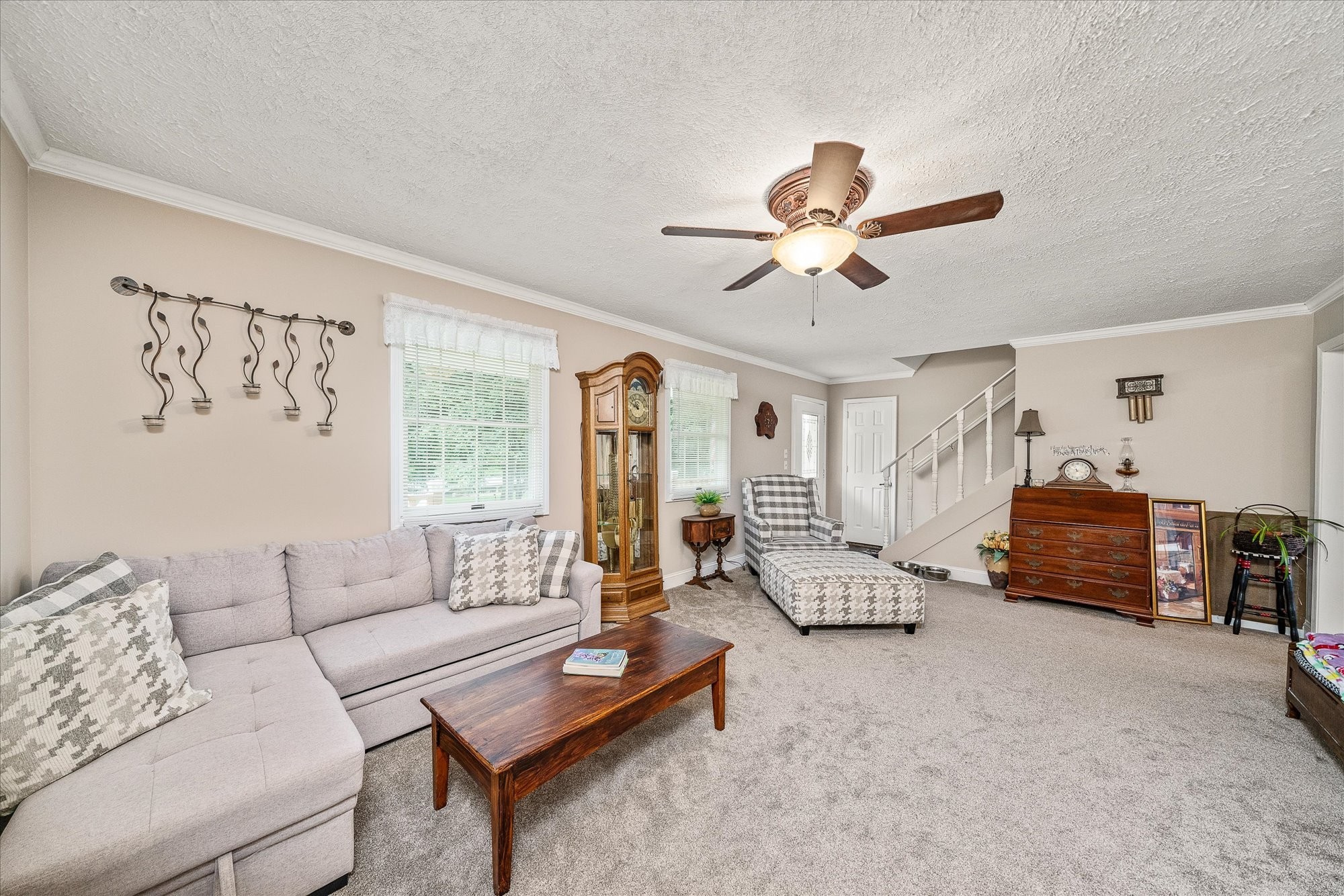 221 Magnolia Road Sparta, TN 38583 - Photo 9 of 36 a living room with furniture gym equipment and a large window