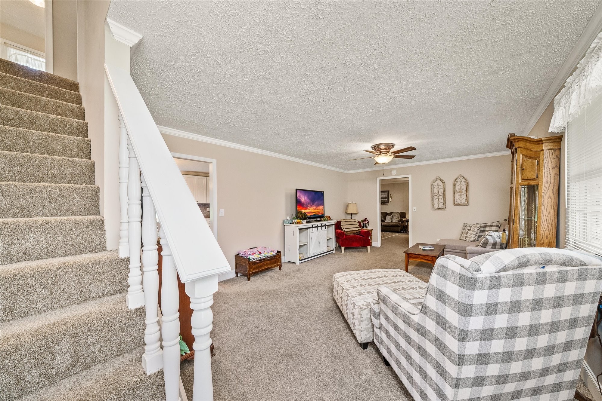 221 Magnolia Road Sparta, TN 38583 - Photo 10 of 36 a living room with furniture and a flat screen tv