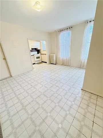 a bedroom with a bed and a cabinets