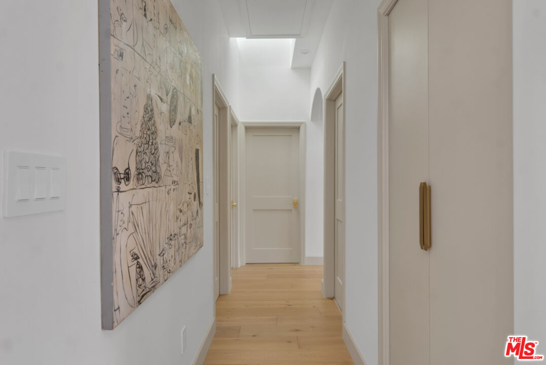 3617 Hillcrest Drive Los Angeles, CA 90016 - Photo 11 of 34 a view of a hallway with wooden floor and entryway