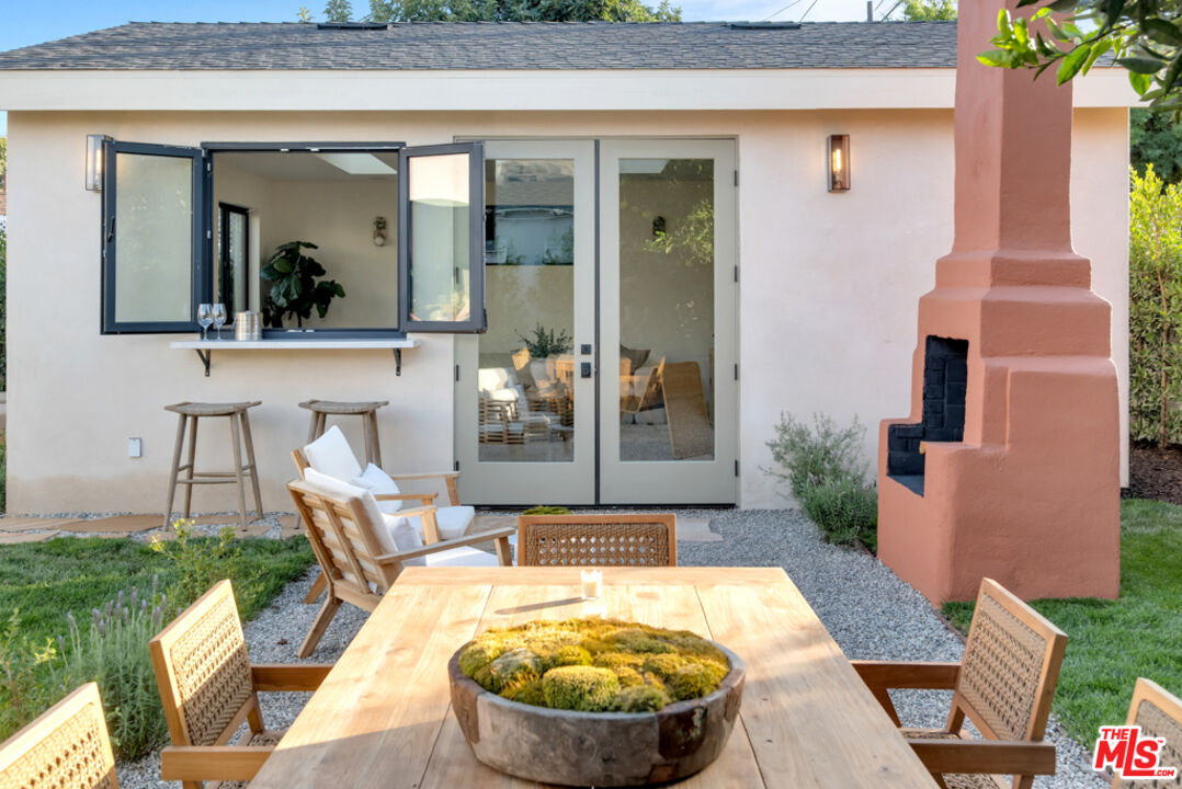 3617 Hillcrest Drive Los Angeles, CA 90016 - Photo 32 of 34 swimming pool view with a seating space