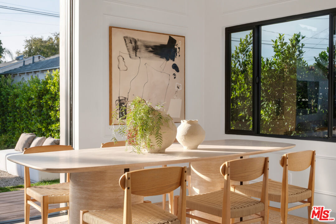 3617 Hillcrest Drive Los Angeles, CA 90016 - Photo 9 of 34 a dining room with furniture and window