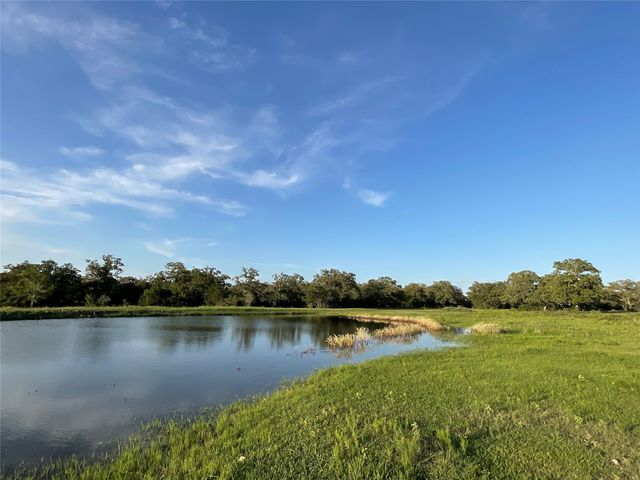 a view of a lake from a yard