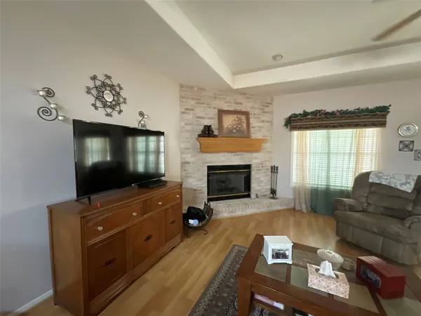 a kitchen with granite countertop cabinets stainless steel appliances and a sink
