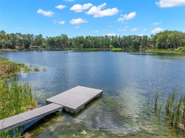 a view of a lake from a yard