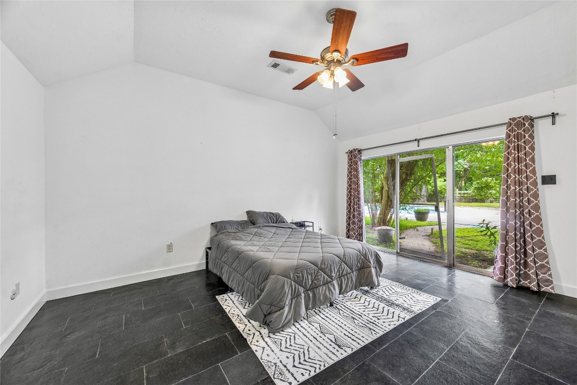 13214 Boca Raton Drive Houston, TX 77069 - Photo 17 of 29 Master bedroom with soaring ceilings and your own sliding glass door to the backyard