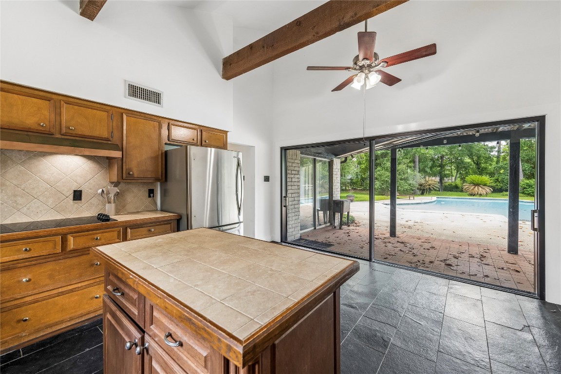 13214 Boca Raton Drive Houston, TX 77069 - Photo 7 of 29 Kitchen view with new sliding glass wall to your covered patio