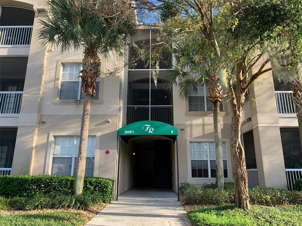 front view of a house with a garden