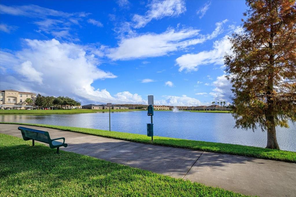 3051 Greystone Loop, Unit 201 Kissimmee, FL 34741 - Photo 16 of 20 a view of lake with green space