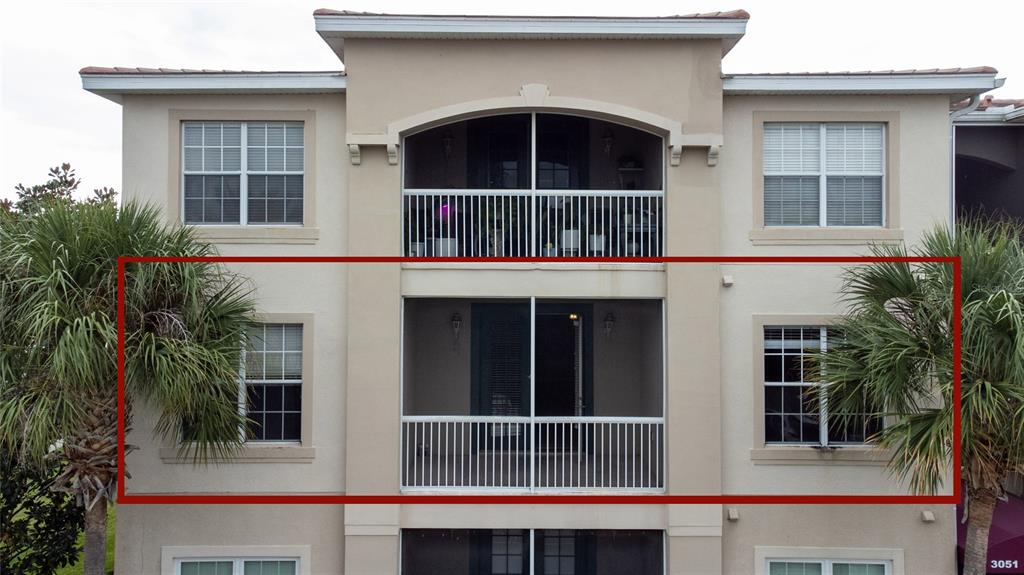 3051 Greystone Loop, Unit 201 Kissimmee, FL 34741 - Photo 2 of 20 a building with a entrance