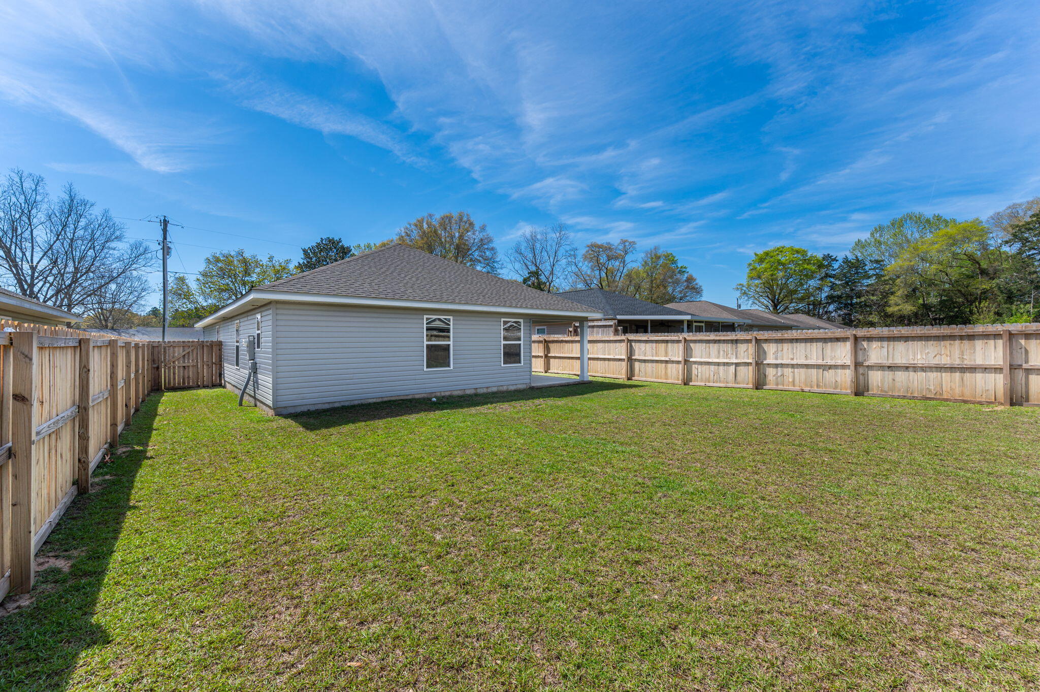 3161 Haskell Langley Road Crestview, FL 32539 - Photo 35 of 36 a view of a backyard with a garden