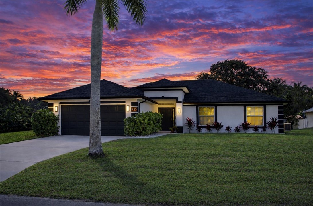 a house view with a garden space