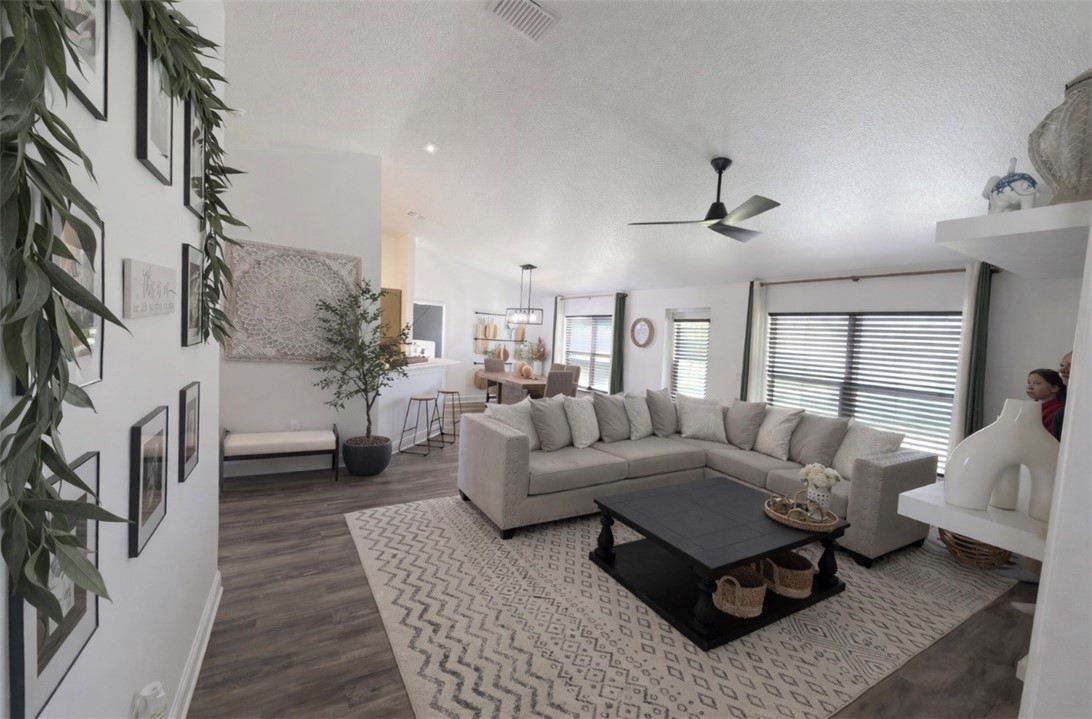 733 Hall Avenue Sebastian, FL 32958 - Photo 5 of 21 a living room with furniture and a fireplace