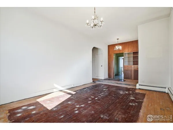 a view of an empty room and window