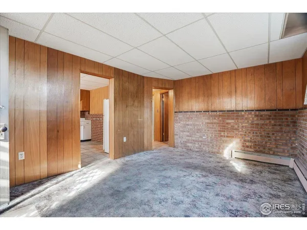 a kitchen with stainless steel appliances granite countertop a stove a sink dishwasher and a refrigerator