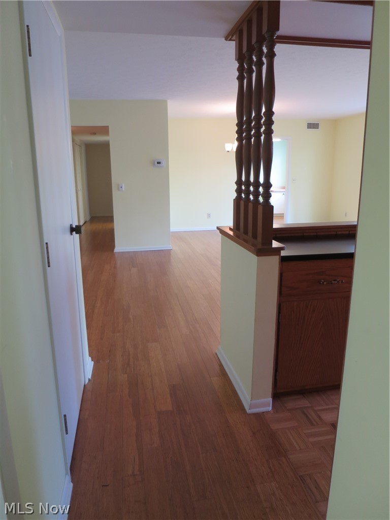3701 Mayfield Road, Unit 118 Cleveland, OH 44121 - Photo 18 of 26 Split hall leading to den/library and 2nd bedroom.