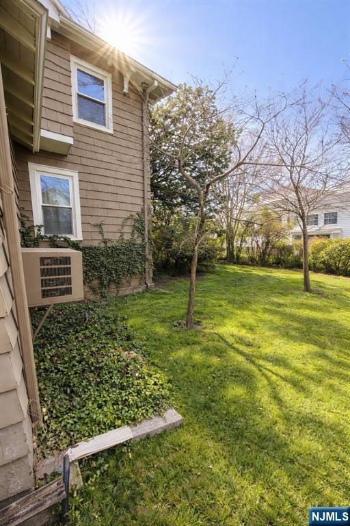 327 Rutland Avenue Teaneck, NJ 07666 - Photo 11 of 12 a view of a backyard with large trees