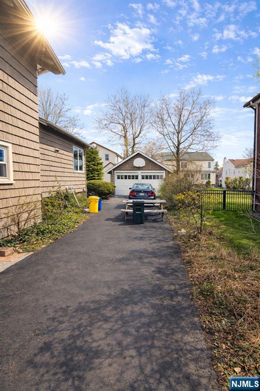 327 Rutland Avenue Teaneck, NJ 07666 - Photo 12 of 12 a car parked in front of a house