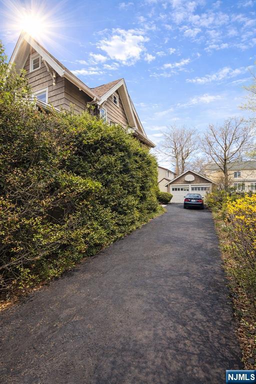 327 Rutland Avenue Teaneck, NJ 07666 - Photo 9 of 12 a view of a house with a street