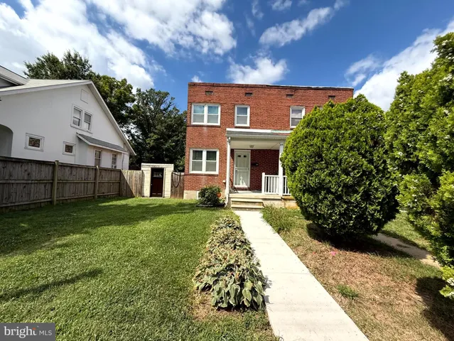 a view of a house with a garden