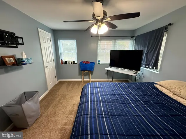 a bathroom with a toilet and a sink