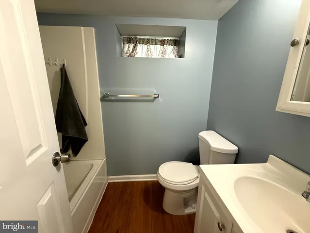 a view of a big room with wooden floor